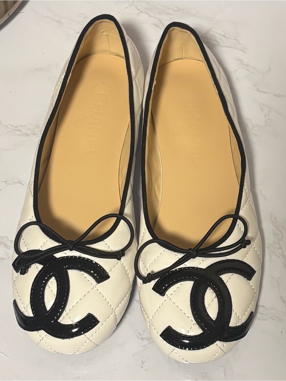 Chanel Cambon Cream Quilted Ballet Flats with Black Trim and Logo